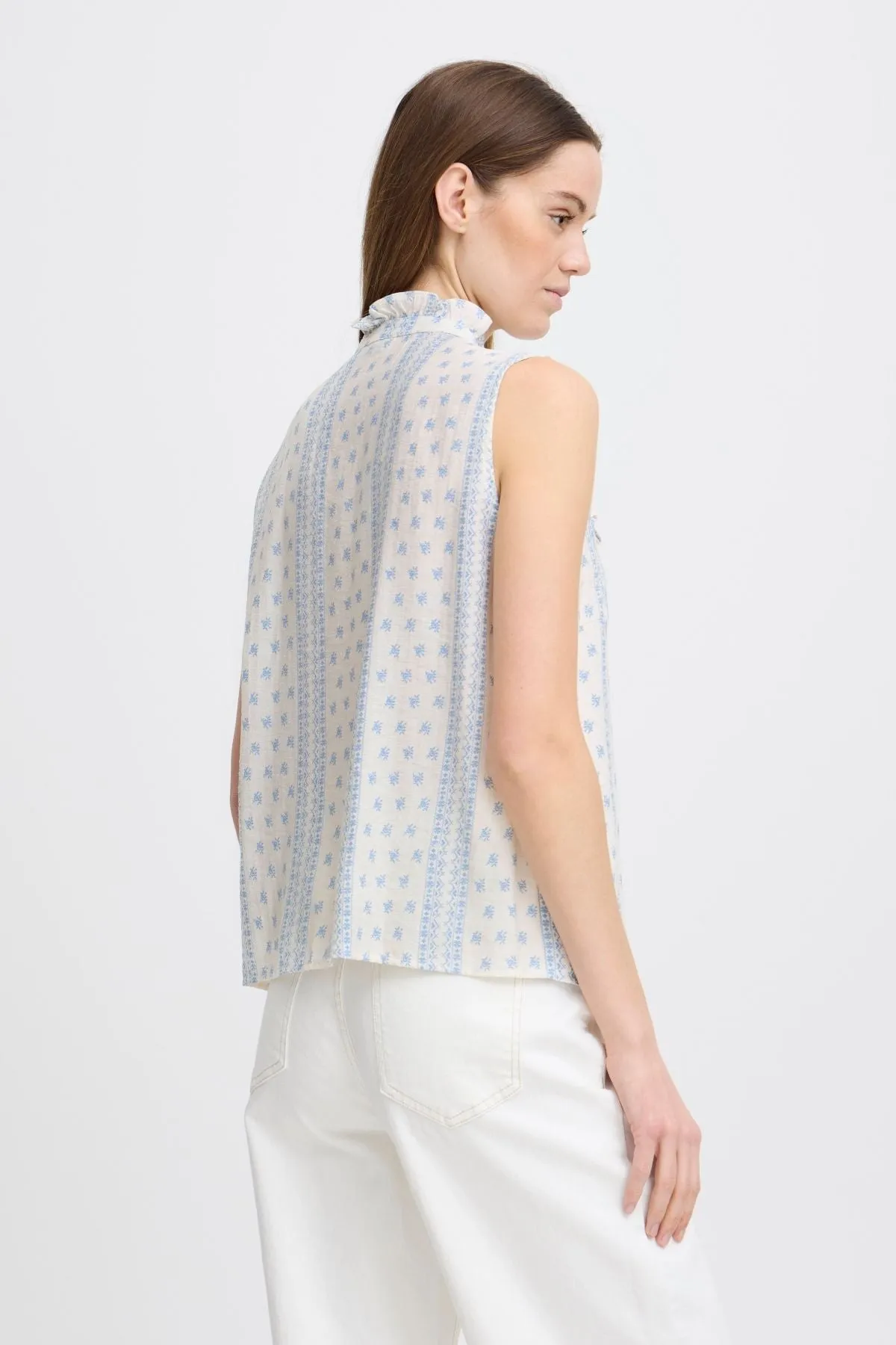 Blue Sleeveless Ruffe Shirt